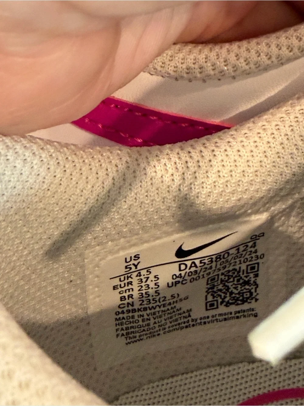 Nike White Sneakers with Pink Swoosh and Accent Stripe